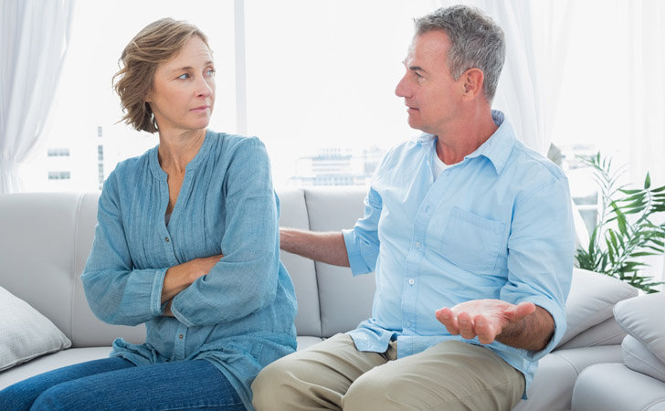 couple in a disagreement disinterested spouse