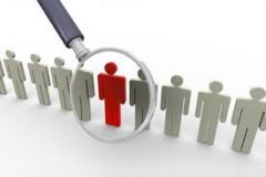 graphic with magnifying glass on figure of person in red hiring mgos