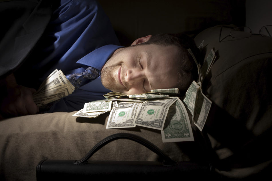 picture of man sleeping on dollar bills successful major gifts