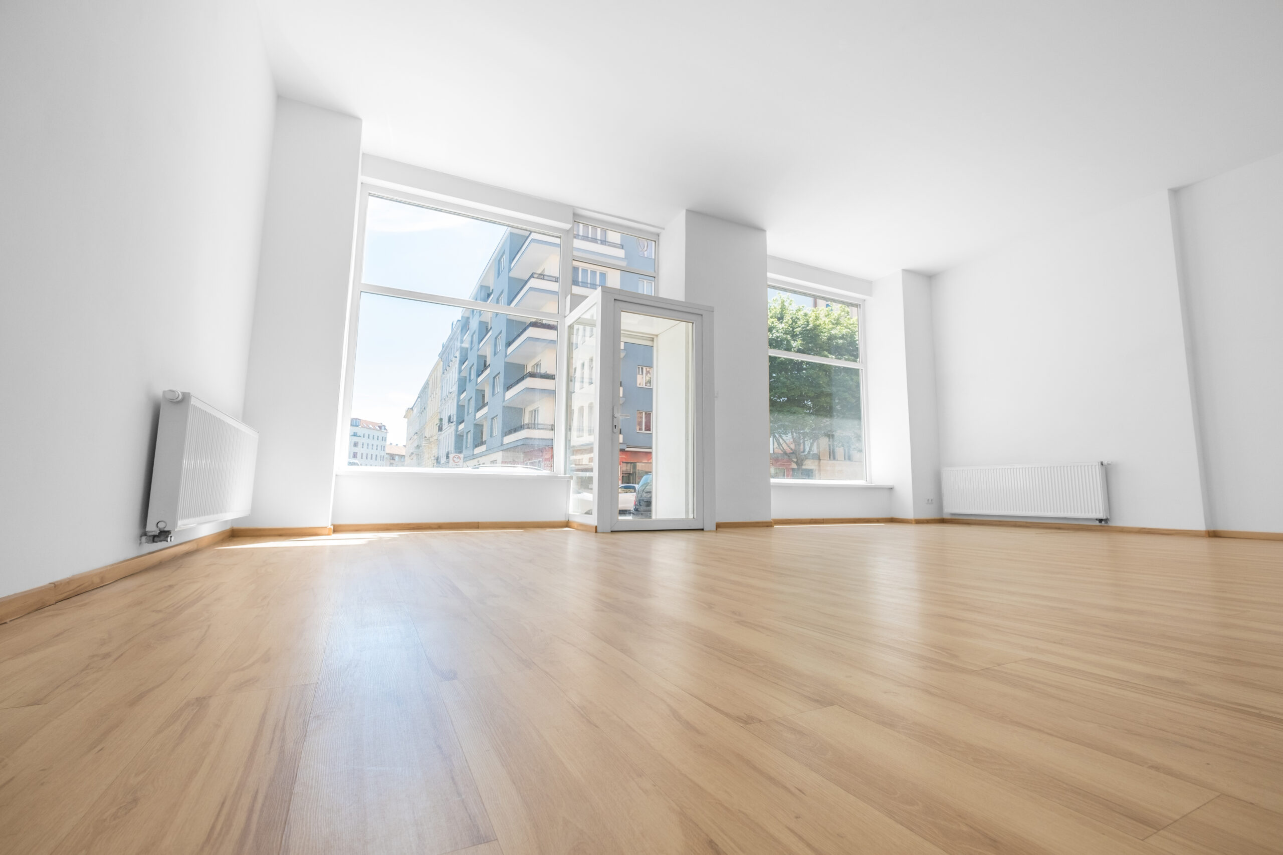Empty room with wooden floor and shopping window. [You Can't Have an Empty Store]