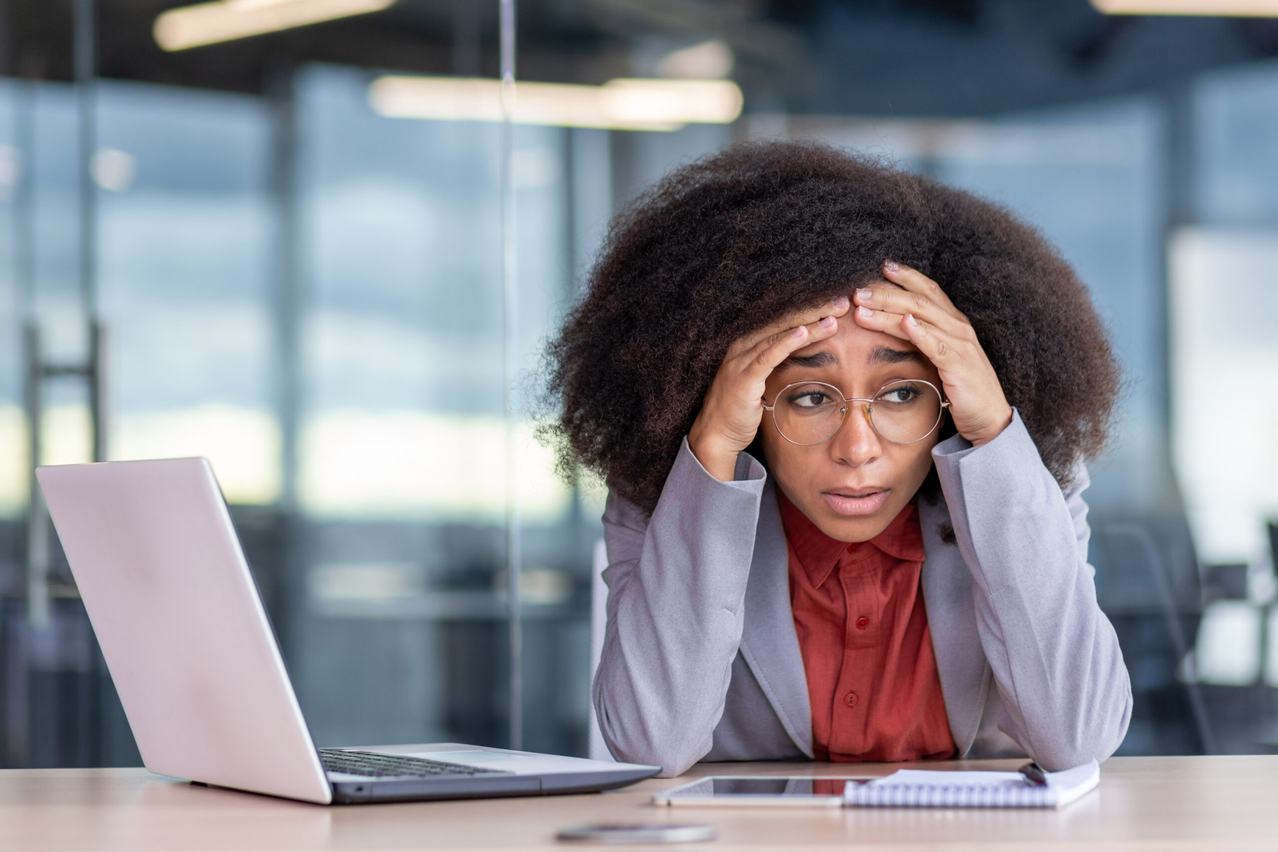 Businesswoman overwhelmed by having to do it all. [Managing Your Workload While Making Big Changes: You Can Do It All, Right?]