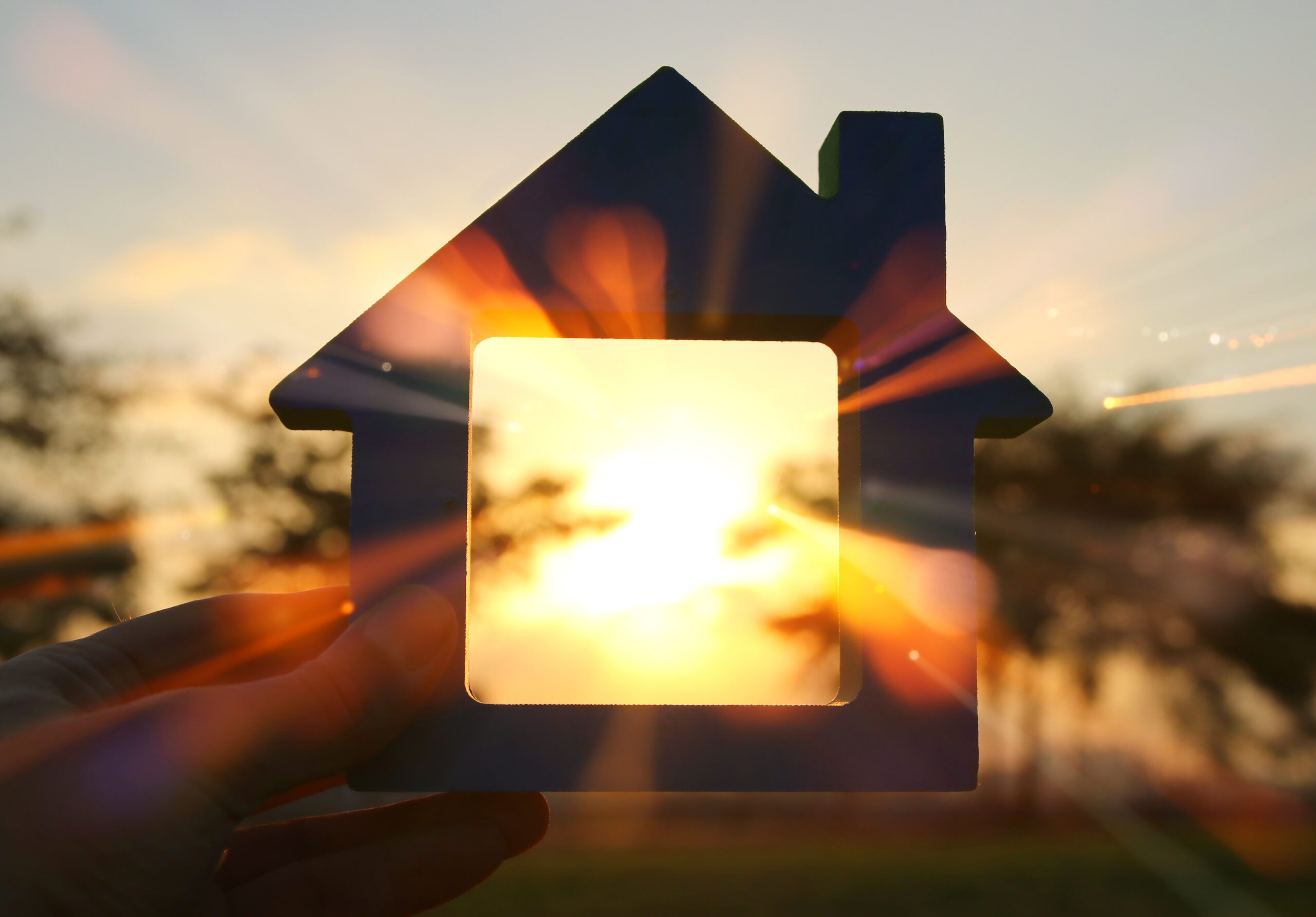 A silhouette of a house with light shining through [What Kind of Home Have Your Created for Your Donor?]